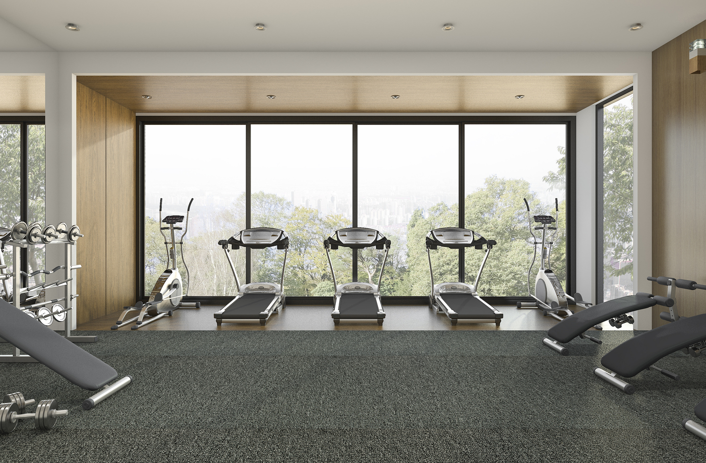 A row of treadmills and elliptical machines arranged for cardio equipment placement in a modern home gym with floor-to-ceiling windows.